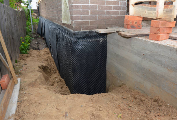 Happy homeowners after waterproofing job in Ridgeway